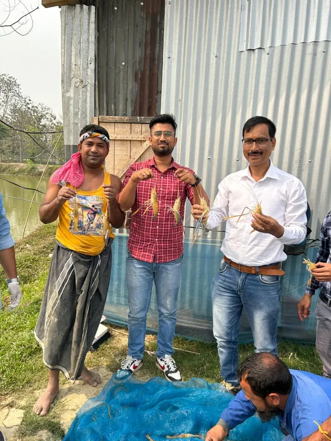 Dr-Pratul-Barman-on-right-and-Najimuddin-farmer-credit-Assam-Fisheries-Department